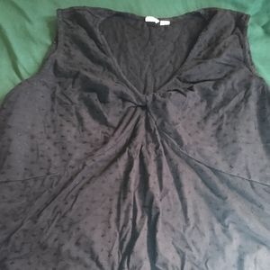 Black sleeveless shirt size 3X.